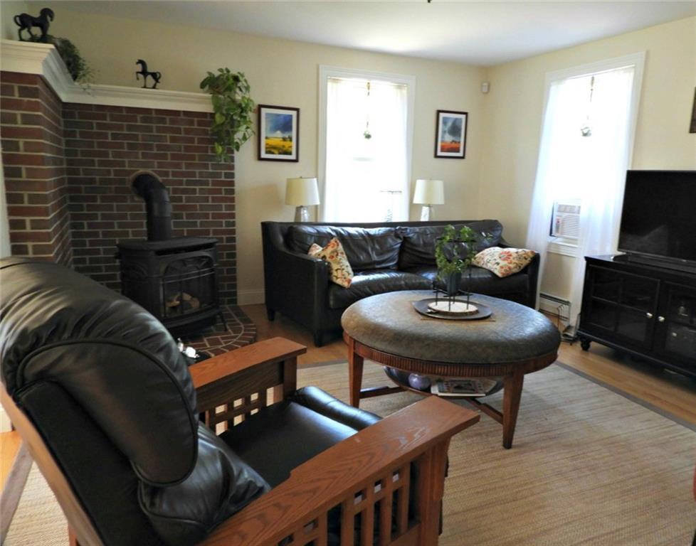 90 Emerys Bridge Road South Berwick, ME 03908 - Photo 12 of 35 Gas stove, fireplace on other side.