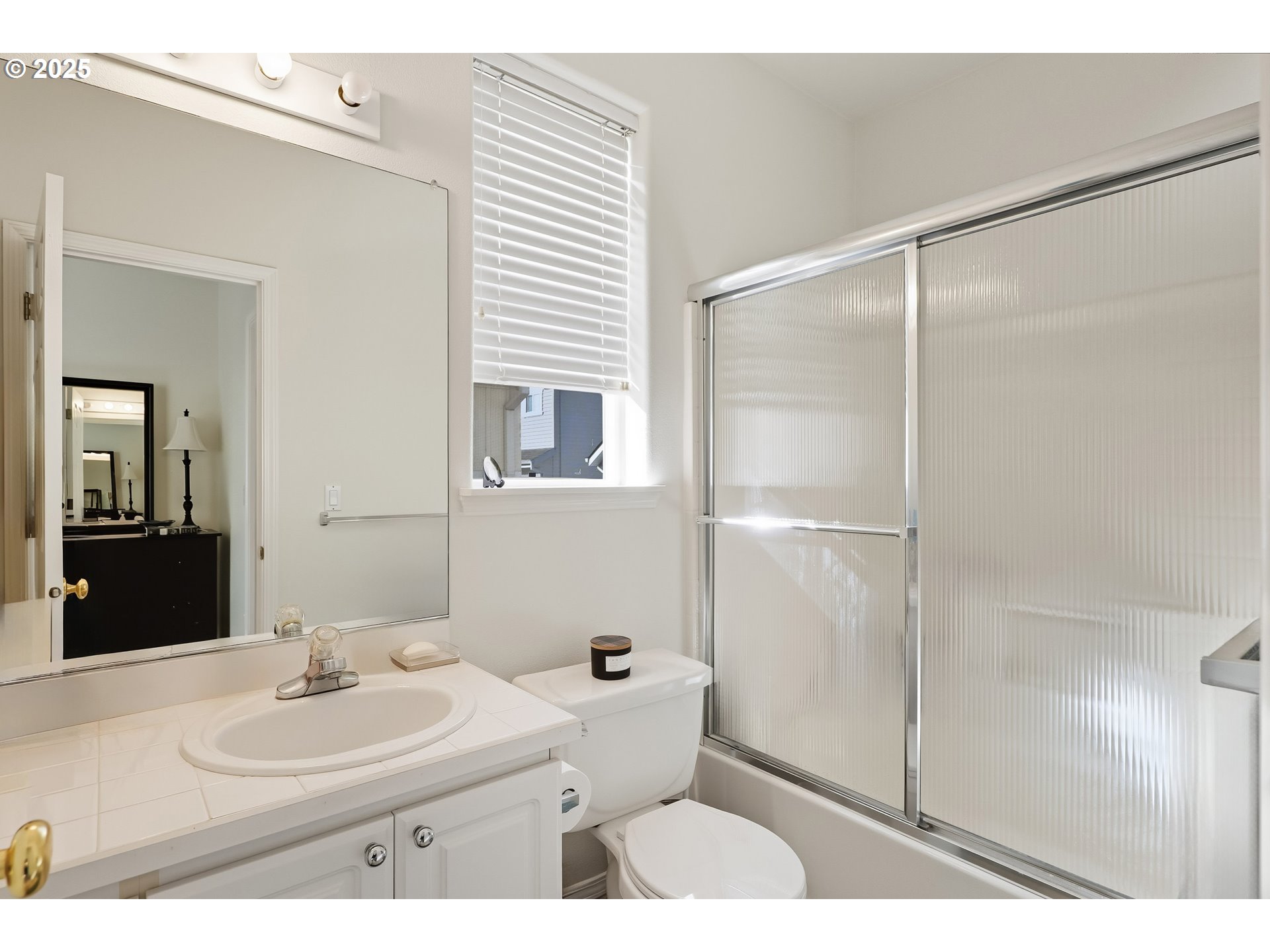27129 Southwest Aden Avenue Wilsonville, OR 97070 - Photo 17 of 31 a bathroom with a sink toilet and shower