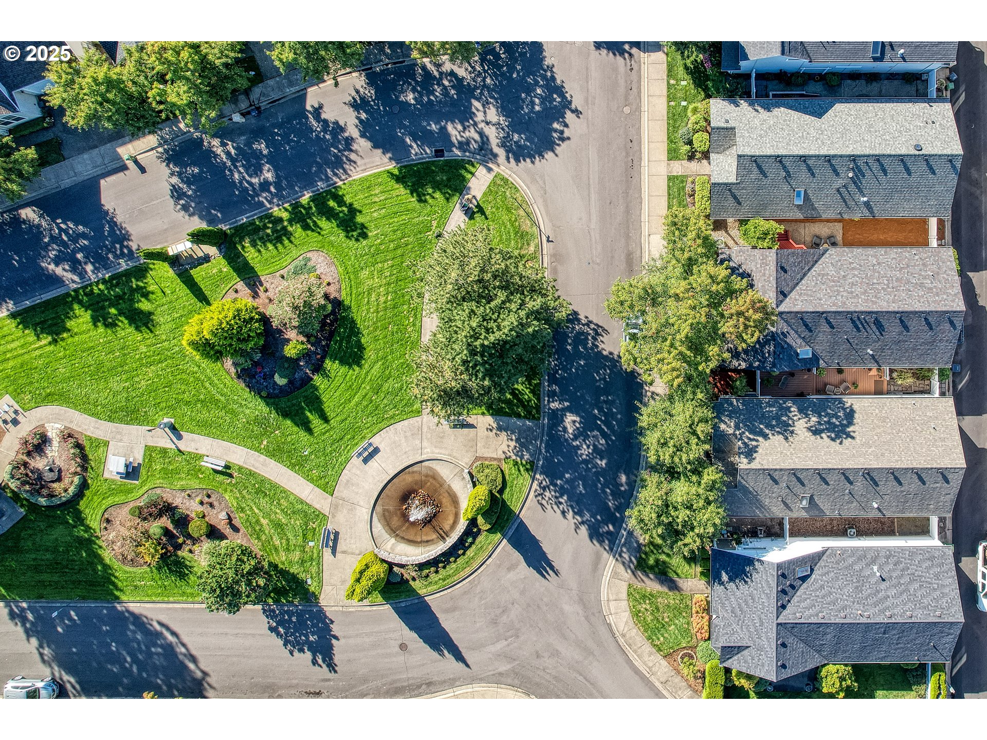 27129 Southwest Aden Avenue Wilsonville, OR 97070 - Photo 29 of 31 an aerial view of a house with a swimming pool a yard and a garden