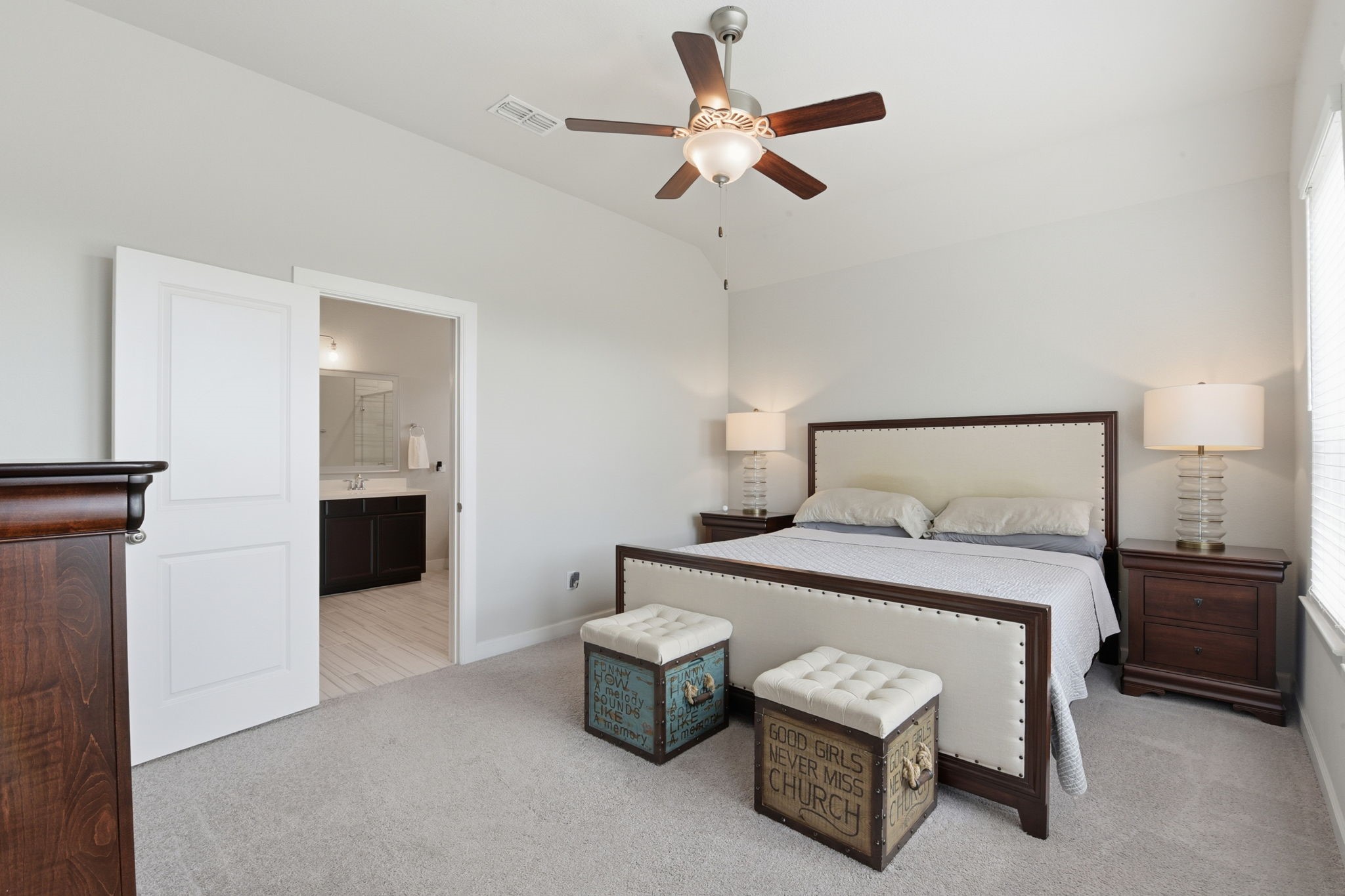 3410 Shockley Lane Rosharon, TX 77583 - Photo 15 of 29 a bedroom with a bed and a chandelier