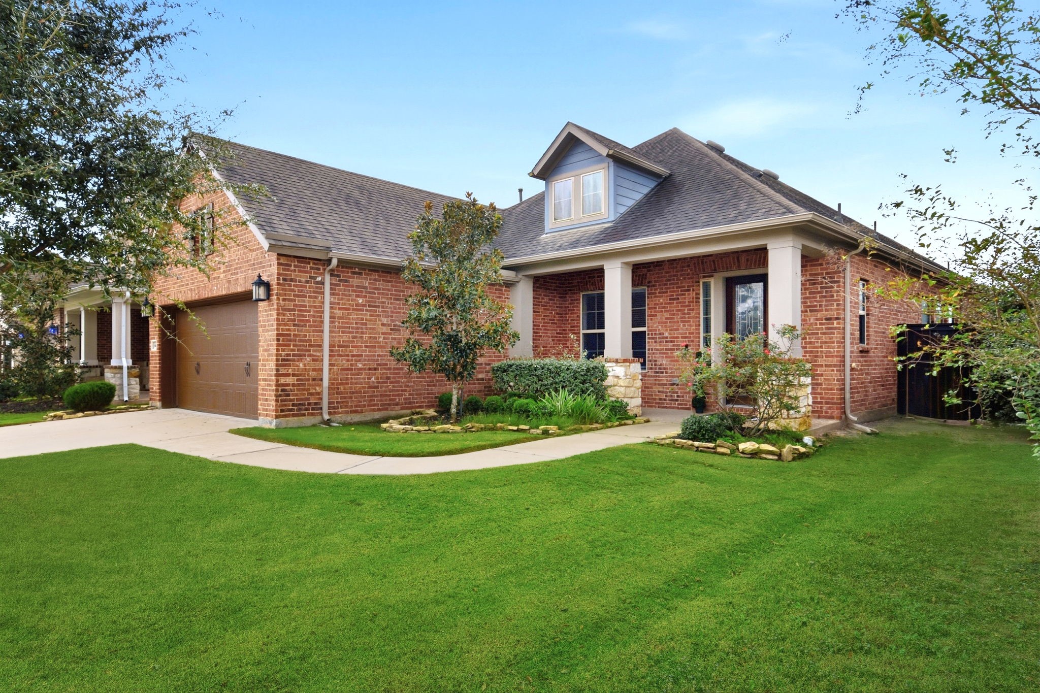 3410 Shockley Lane Rosharon, TX 77583 - Photo 4 of 29 a front view of a house with a yard and garage