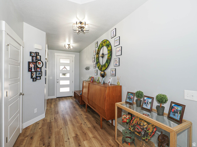 2487 Canyon Wild Road, Unit 413 Draper, UT 84020 - Photo 12 of 75 Foyer entrance featuring wood finished floors and baseboards
