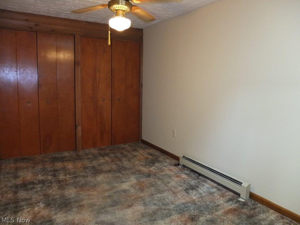 5891 Springlake Road Northwest Canton, OH 44718 - Photo 10 of 20 Bedroom 3 with double closets, including a cedar closet.