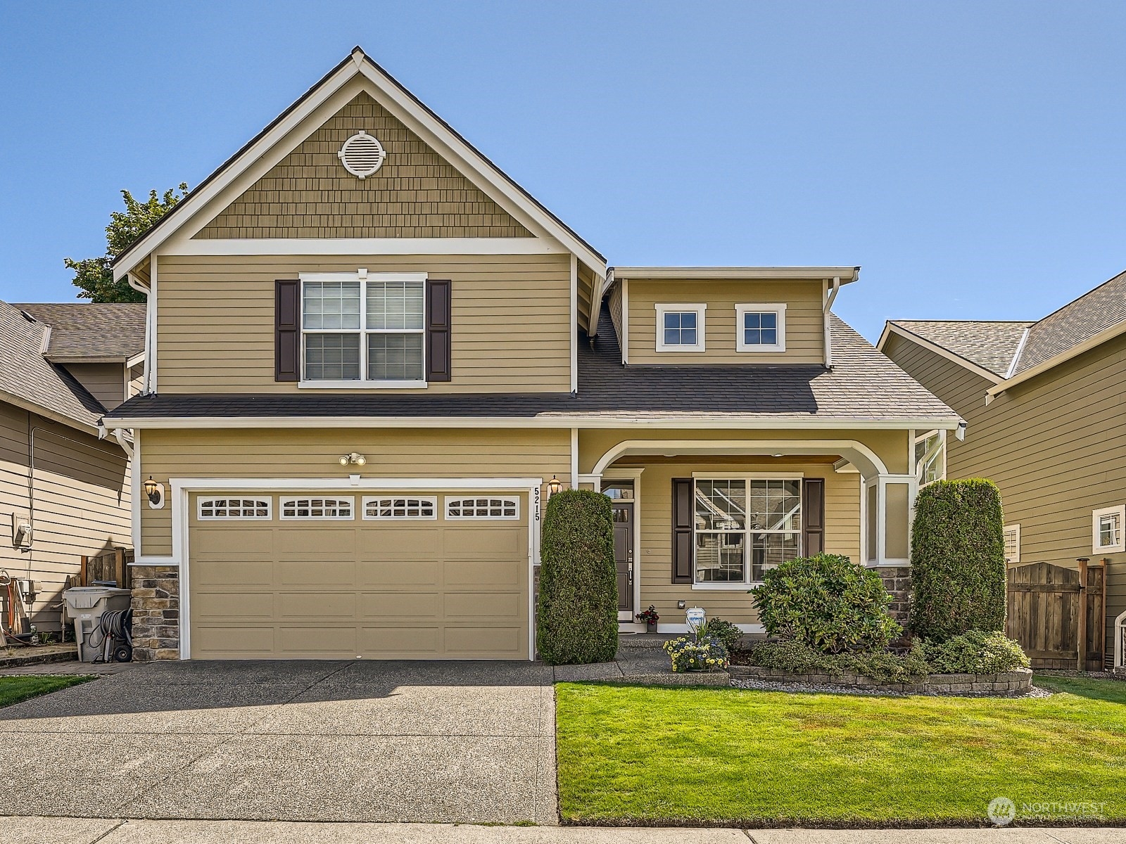 5215 Northeast 3rd Place Renton, WA 98059 - Photo 1 of 23 a front view of a house