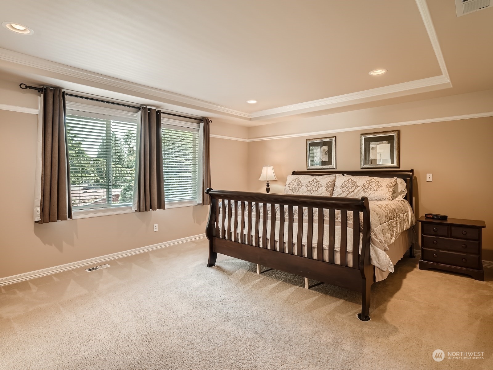 5215 Northeast 3rd Place Renton, WA 98059 - Photo 11 of 23 a bedroom with a bed and a window