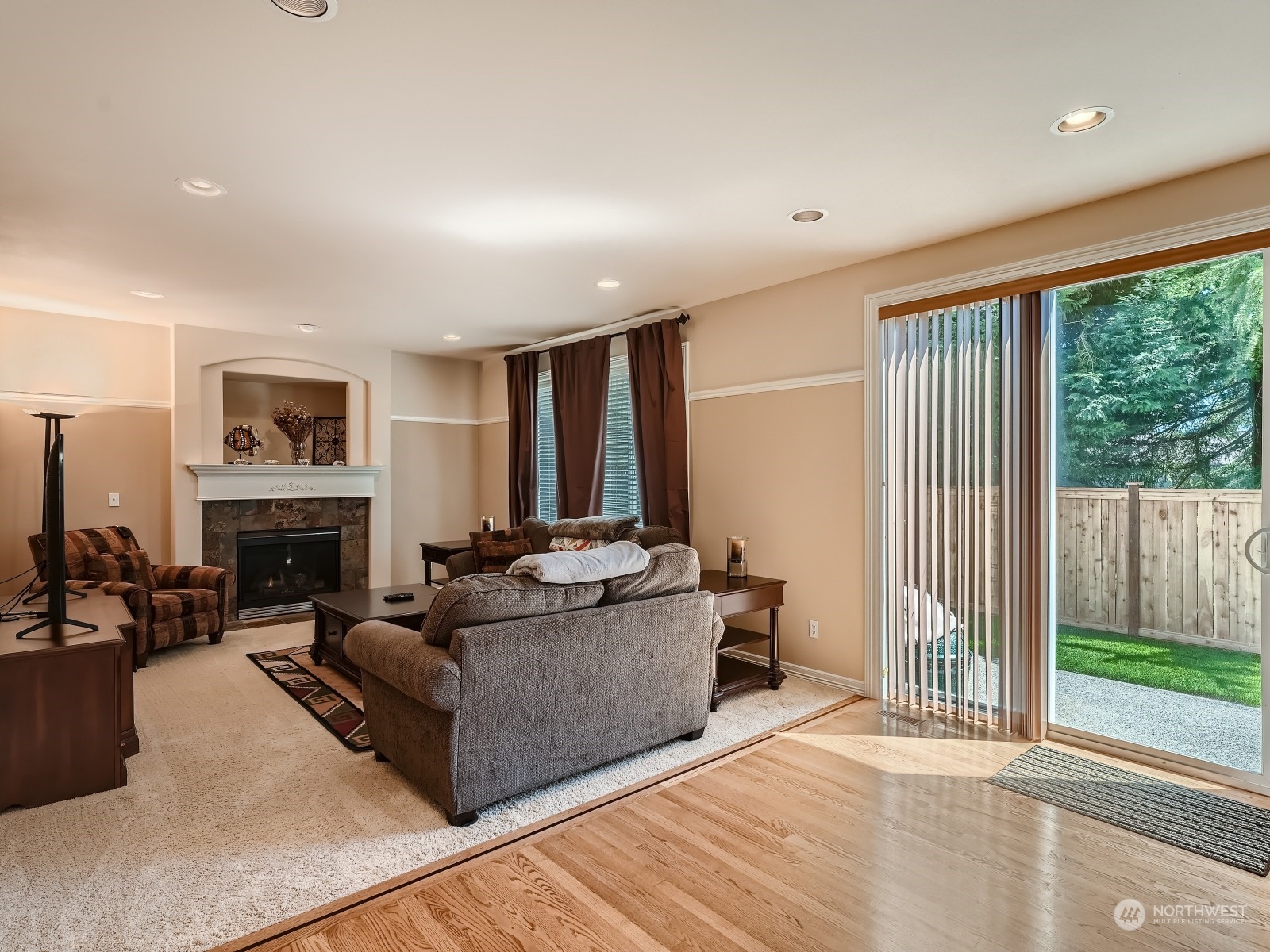 5215 Northeast 3rd Place Renton, WA 98059 - Photo 9 of 23 a living room with furniture and a fireplace