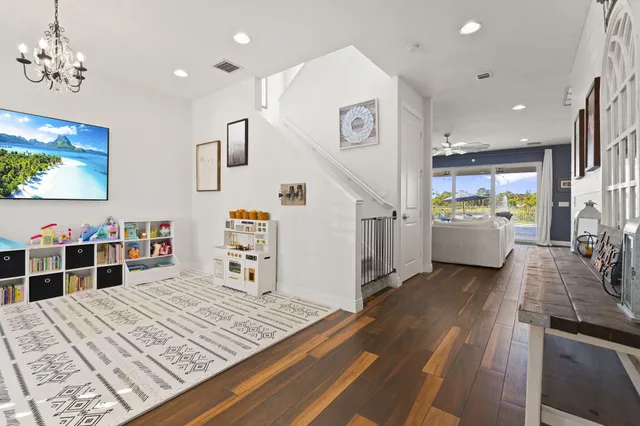 a bedroom with furniture and window