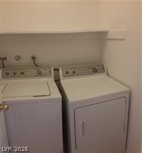 1448 Star Road, Unit 2 Pahrump, NV 89048 - Photo 9 of 10 Functional laundry appliances stand ready for daily chores.