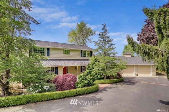 7621 Skipley Road Snohomish, WA 98290 - Photo 2 of 25 front view of a house with a garden