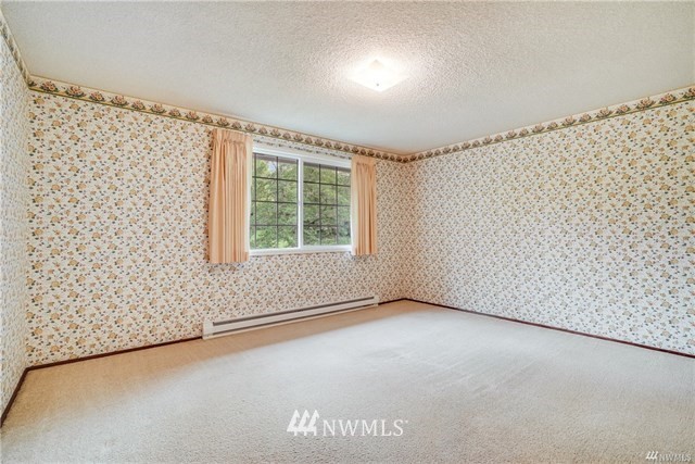 7621 Skipley Road Snohomish, WA 98290 - Photo 17 of 25 an empty room with windows
