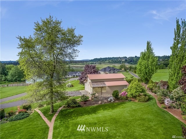 7621 Skipley Road Snohomish, WA 98290 - Photo 18 of 25 a aerial view of a house with a garden