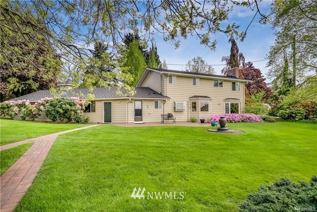 7621 Skipley Road Snohomish, WA 98290 - Photo 23 of 25 a view of a house with backyard and garden