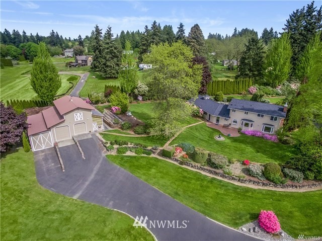 7621 Skipley Road Snohomish, WA 98290 - Photo 24 of 25 an aerial view of a house with a garden and a yard