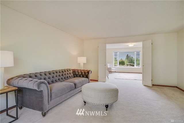 7621 Skipley Road Snohomish, WA 98290 - Photo 8 of 25 a living room with furniture and a large window