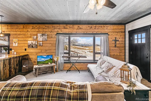 a kitchen with stainless steel appliances granite countertop a refrigerator and a stove