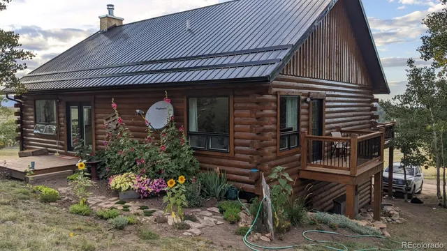 a view of a glass door and a window