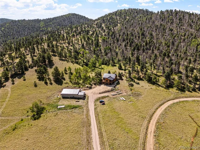 a view of a lake with mountain in the background
