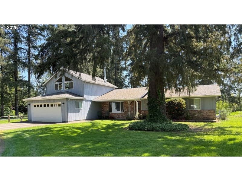5203 Northeast 246th Street Ridgefield, WA 98642 - Photo 1 of 7 a black and white photo of a house