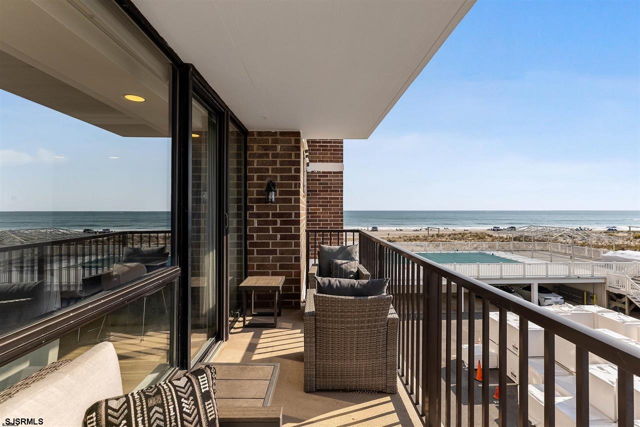 9100 Beach 304, Unit 304 Margate City, NJ 08402 - Photo 17 of 25 a view of balcony with wooden floor