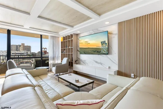 a living room with a couch and a flat screen tv