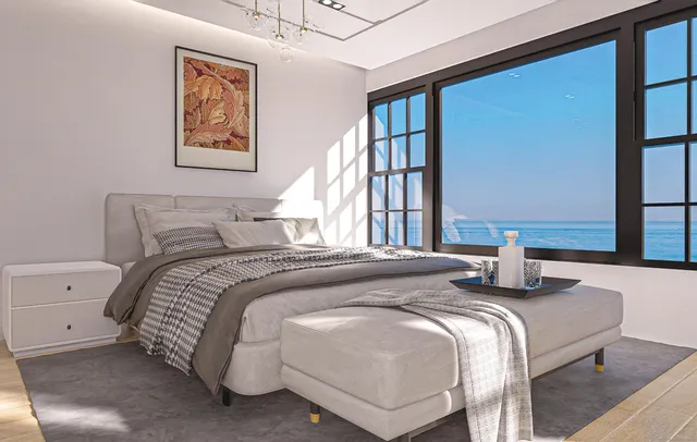 a bedroom with a bed and a window