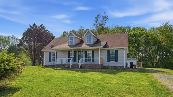 front view of a house with a garden