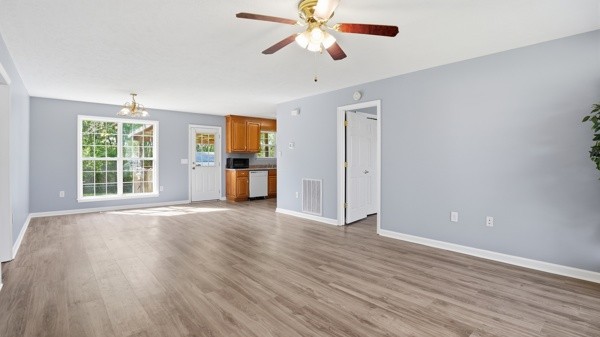 19 Ash Grove Road Fayetteville, TN 37334 - Photo 14 of 31 an empty room with wooden floor and windows
