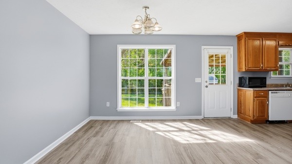 19 Ash Grove Road Fayetteville, TN 37334 - Photo 15 of 31 a view of an empty room with a window and kitchen view