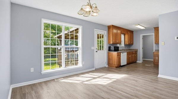 19 Ash Grove Road Fayetteville, TN 37334 - Photo 16 of 31 a view of a kitchen with a sink dishwasher and a refrigerator