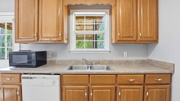 19 Ash Grove Road Fayetteville, TN 37334 - Photo 19 of 31 a kitchen with granite countertop a sink and cabinets