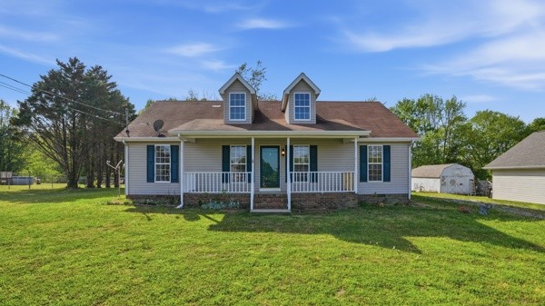19 Ash Grove Road Fayetteville, TN 37334 - Photo 2 of 31 a front view of a house with garden