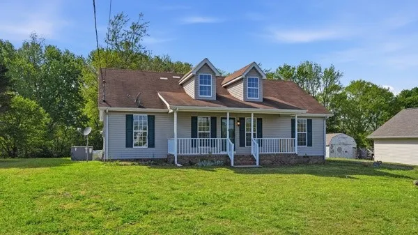 a view of a house with a garden