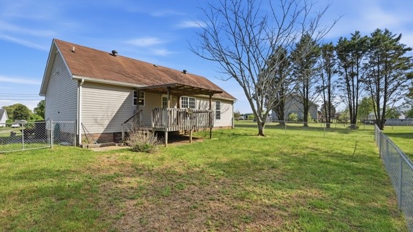 19 Ash Grove Road Fayetteville, TN 37334 - Photo 7 of 31 a view of a house with a big yard and large tree