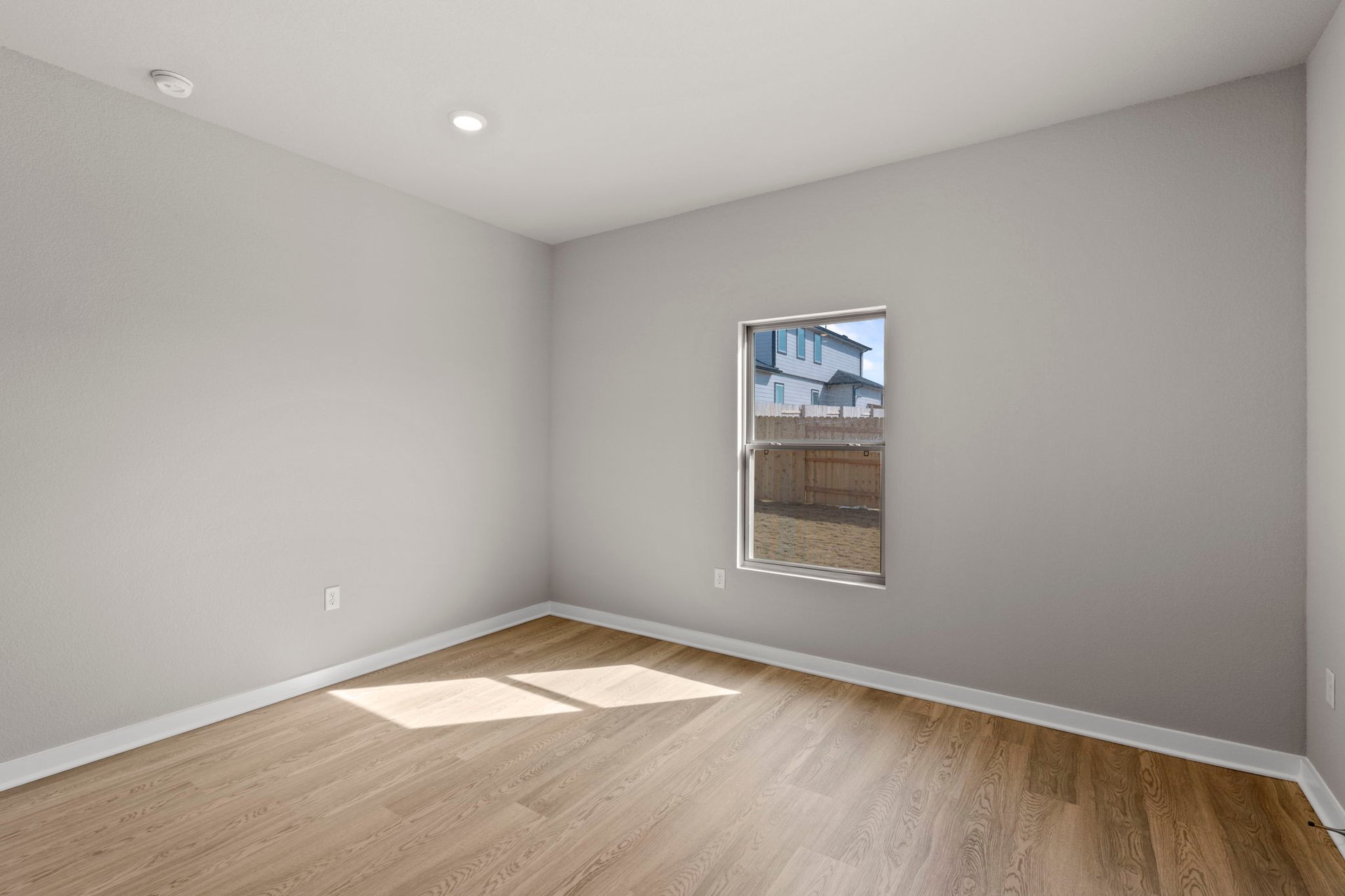 13613 Gray Landing Drive Elgin, TX 78621 - Photo 11 of 33 an empty room with a window