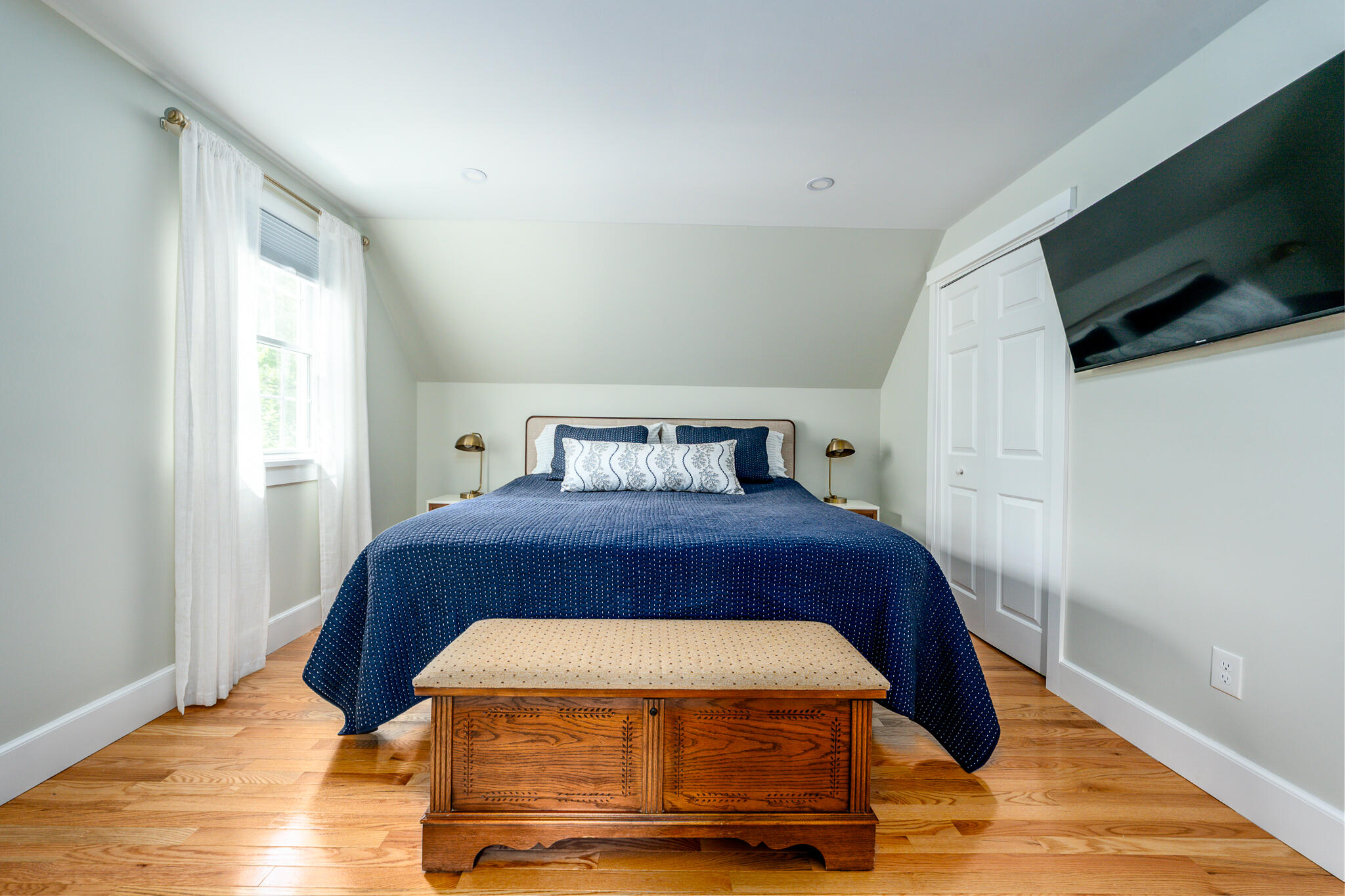 61 Angus Way Centerville, MA 02632 - Photo 26 of 59 a bedroom with a bed and a flat screen tv