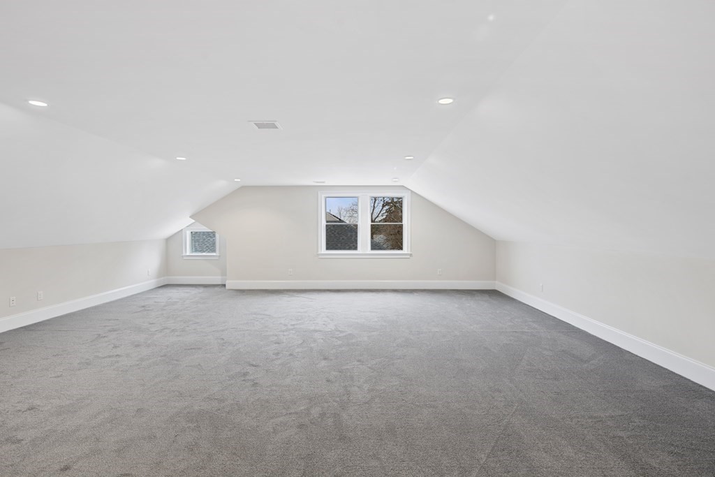 28 Hillside Avenue Needham, MA 02494 - Photo 29 of 32 a view of an empty room with windows