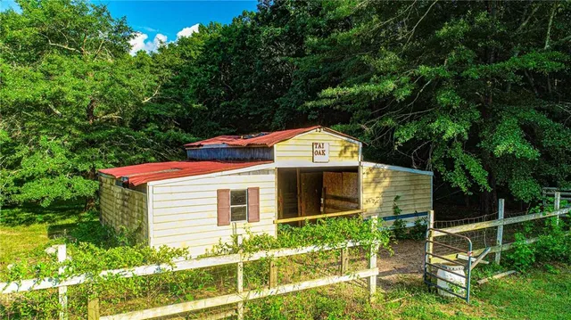 a view of house with outdoor space