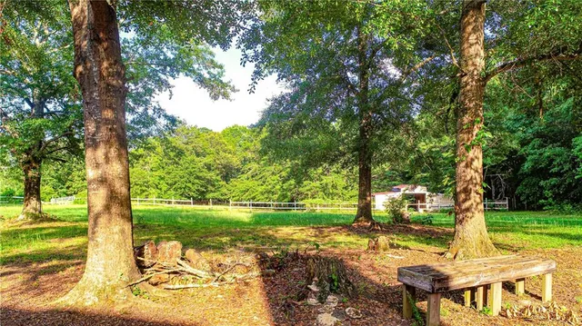 a view of a patio with a yard