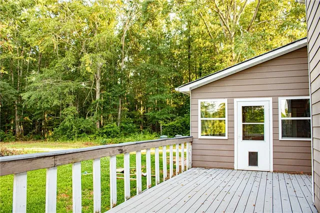 a view of a two chairs on the roof deck