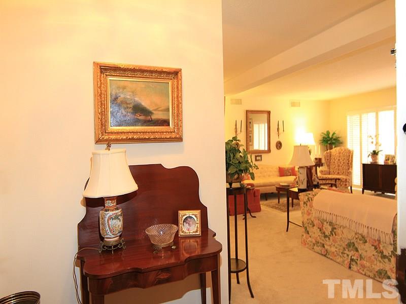 4709 Edwards Mill Road, Unit D Raleigh, NC 27612 - Photo 2 of 18 A large coat closet is located to the left of the table in the foyer. Great storage!