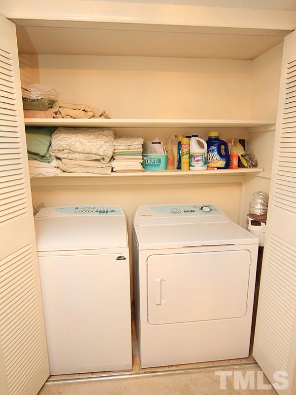 4709 Edwards Mill Road, Unit D Raleigh, NC 27612 - Photo 12 of 18 Full size washer and dryer convey.
