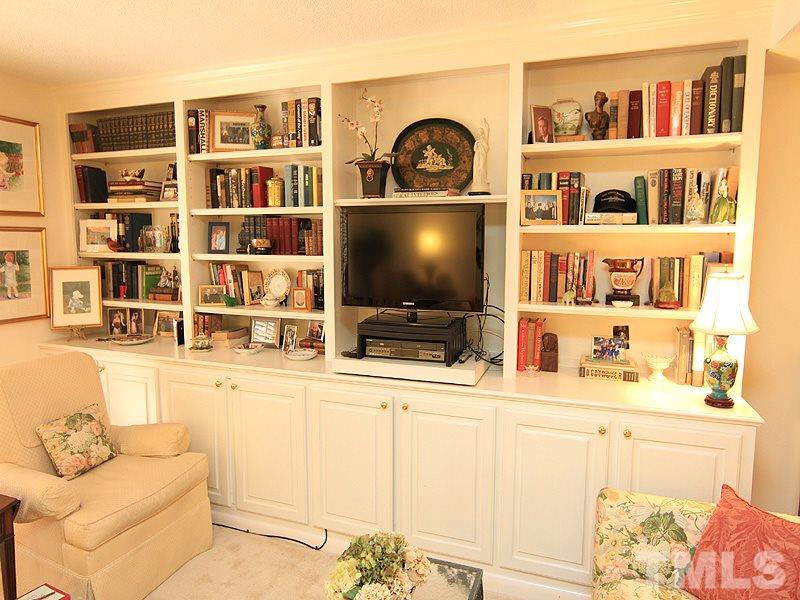 4709 Edwards Mill Road, Unit D Raleigh, NC 27612 - Photo 13 of 18 Custom bookcases and cabinets were added.