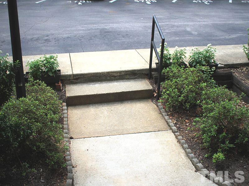 4709 Edwards Mill Road, Unit D Raleigh, NC 27612 - Photo 16 of 18 Only 2 steps down and 9 steps to the condominium front door!