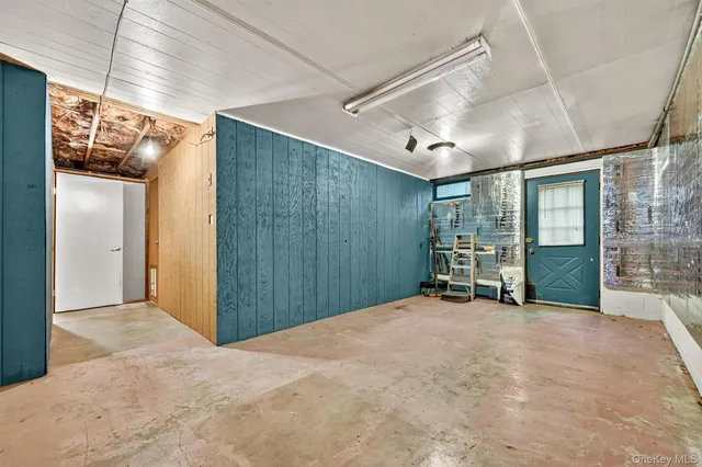 a view of a livingroom with wooden floor