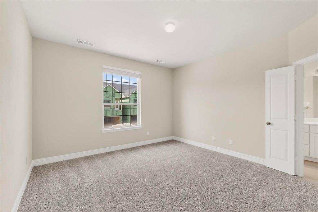 900 Heart Reef Road Plano, TX 75075 - Photo 17 of 40 a view of an empty room with a window