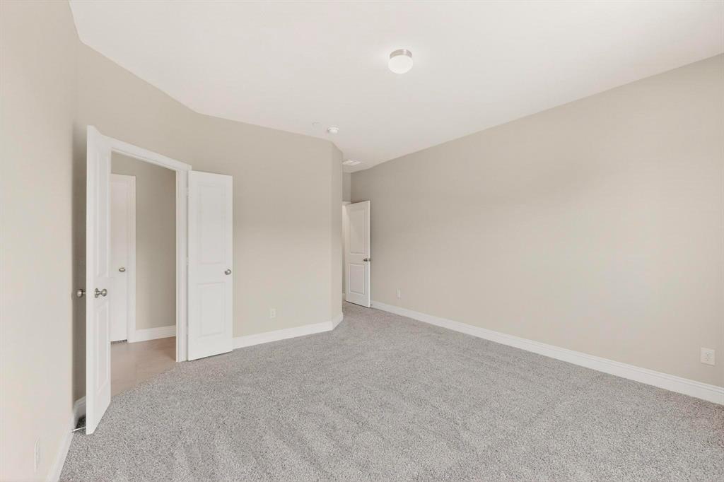 900 Heart Reef Road Plano, TX 75075 - Photo 19 of 40 a view of an empty room
