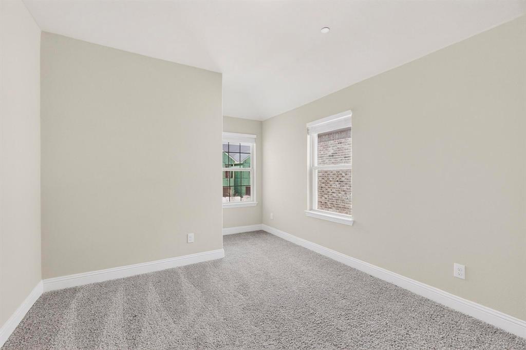 900 Heart Reef Road Plano, TX 75075 - Photo 23 of 40 a view of an empty room with a window