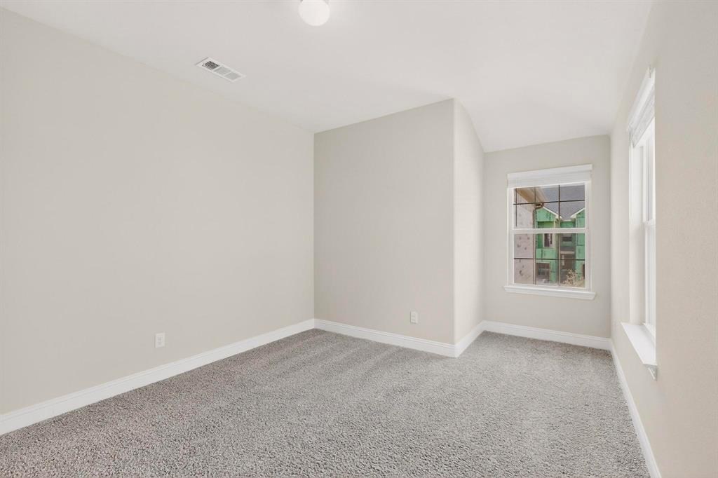 900 Heart Reef Road Plano, TX 75075 - Photo 24 of 40 a view of an empty room with a window