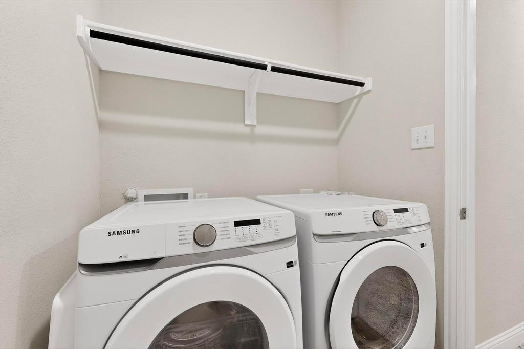 900 Heart Reef Road Plano, TX 75075 - Photo 37 of 40 a utility room with dryer and washer