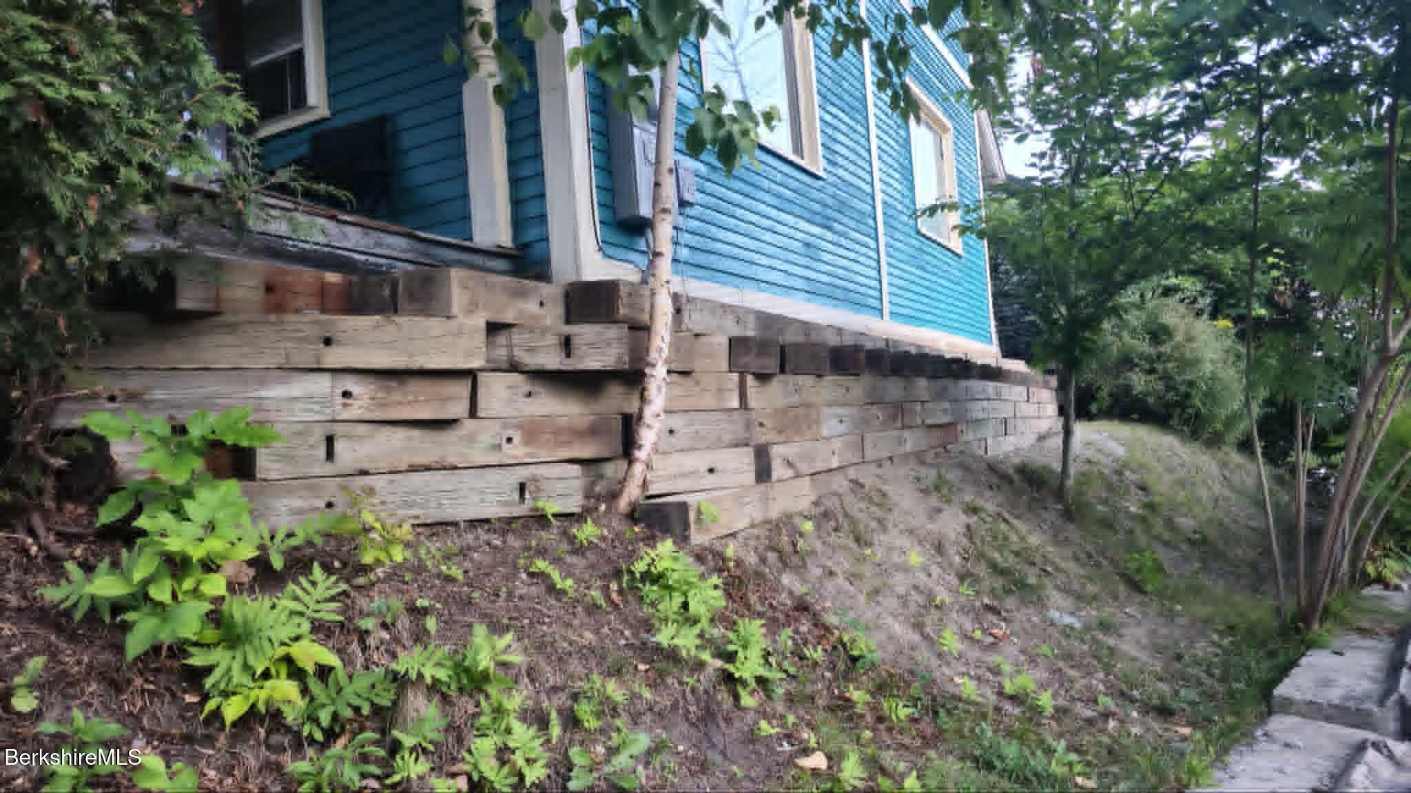 24 Franklin Street North Adams, MA 01247 - Photo 11 of 45 a backyard of a house with lots of green space